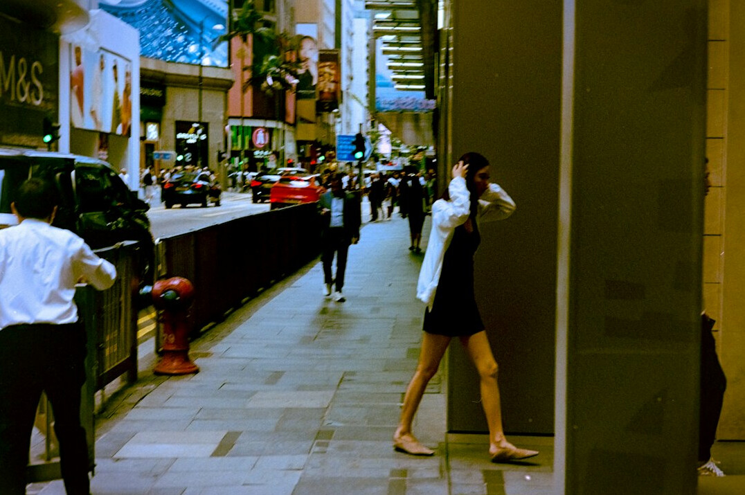 store detective watching shoppers
